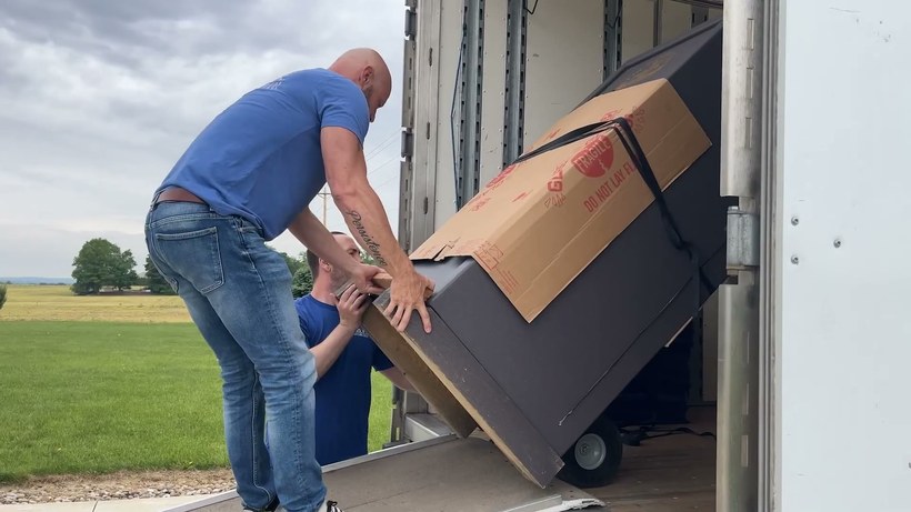 Countryside Logistics crew handling a piece on a Greater Nashville job
